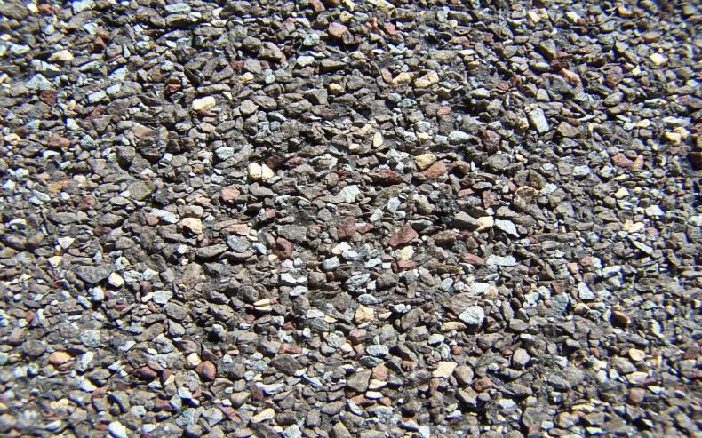 Close up normal asphalt shingle granule surface